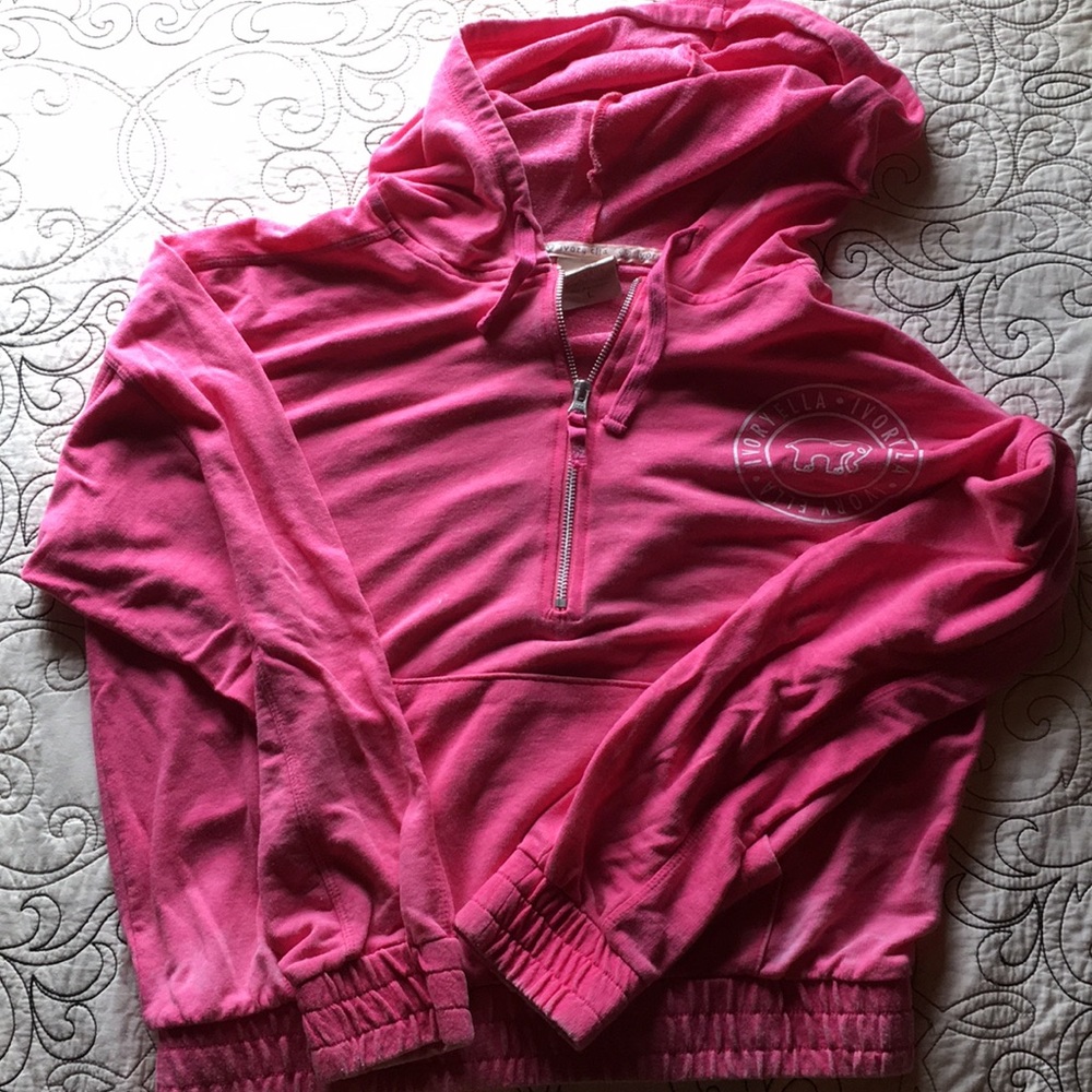 Pink three-quarter zip hooded sweatshirt
